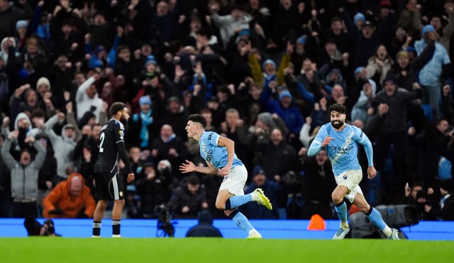 Manchester City’s Phil Foden celebrates scoring a late winner against Leeds