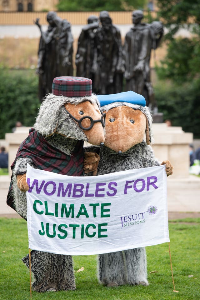 Environmental campaigners take part in the Time Is Now mass lobby and protest in Westminste