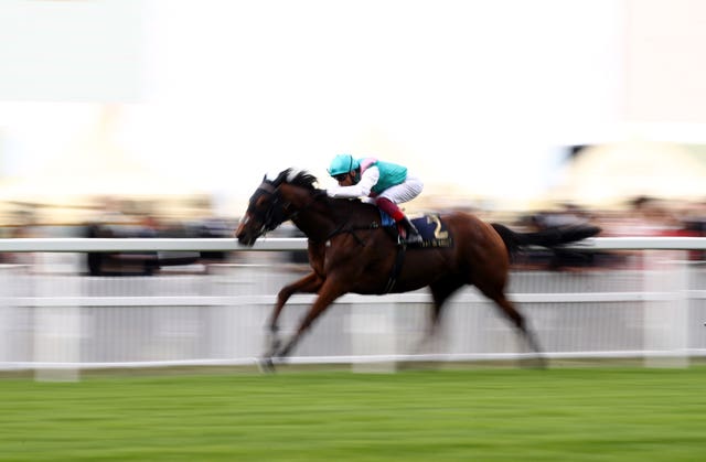 Monarchs Glen and Frankie Dettori on theur way to victory in the Wolferton Stakes at Royal Ascot