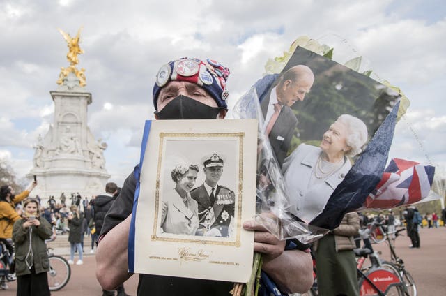 Royal superfan John Loughrey outside Buckingham Palace