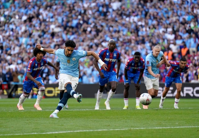 Manchester City’s Omar Marmoush sees his penalty saved