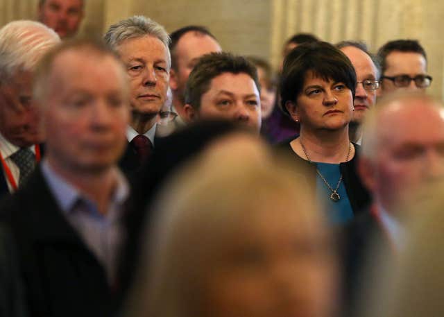 DUP leader Arlene Foster (right) and former leader Peter Robinson attend the unveiling of a portrait of former deputy first minister Martin McGuinness in the Great Hall of Parliament Buildings, Stormont (Brian Lawless/PA)