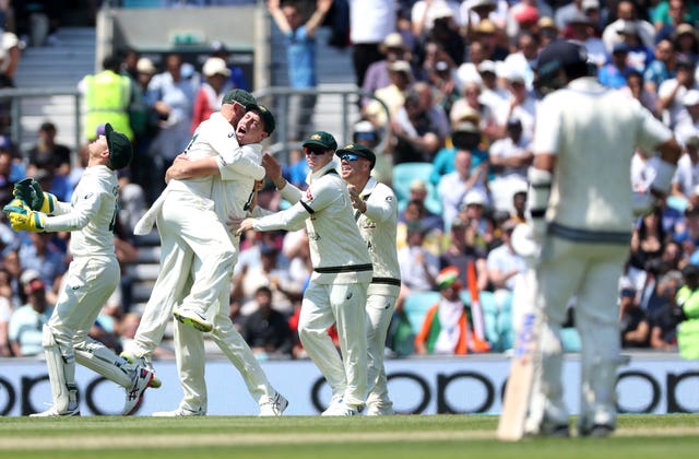 Australia celebrate Ajinkya Rahane's dismissal