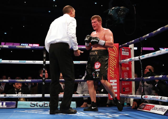 The referee checks on with Alexander Povetkin 