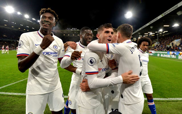 Christian Pulisic (centre) has had to work hard for his place in the Chelsea team
