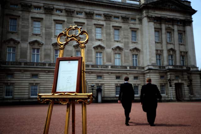 An easel was placed in the Forecourt of Buckingham Palace in London to announce the birth of Princess Charlotte in 2015. (Steve Parson/PA)
