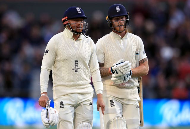 Jonny Bairstow (left) and Ben Stokes (right) will resume England's challenge on Saturday
