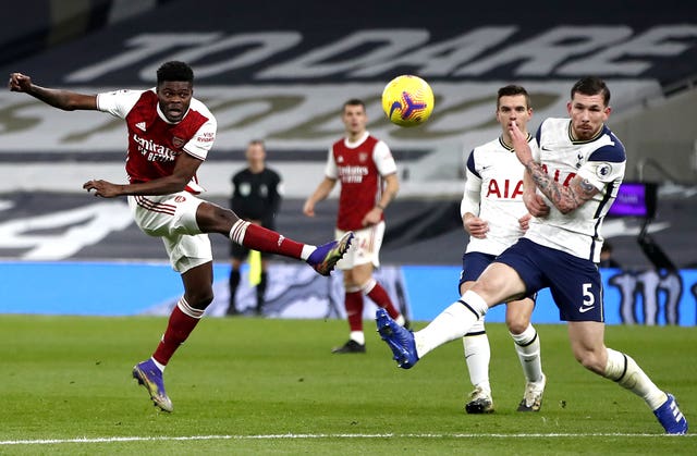 Arsenal's Thomas Partey in action against Tottenham