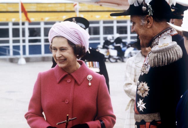The Queen now favours wide brimmed hats, rather than the style she wore in the 1970s (PA)