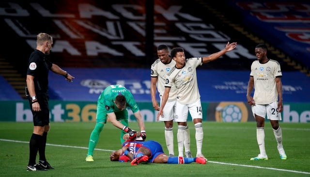 atrick van Aanholt, on the ground, has played 29 times for Crystal Palace this season