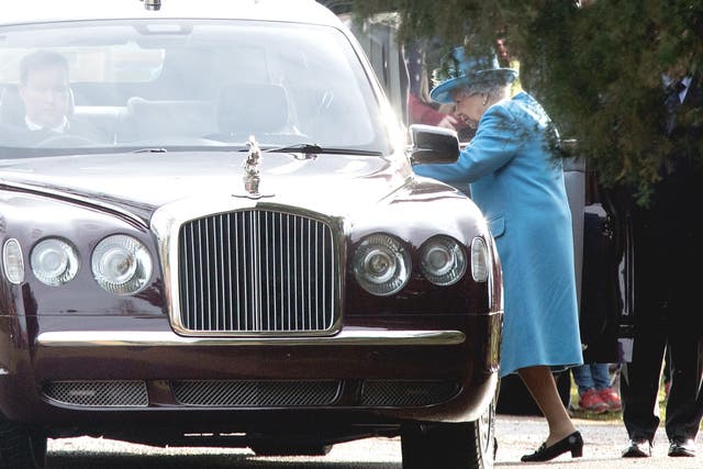 The Queen departs from the royal car ahead of the service (Aaron Chown/PA)