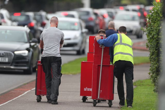 Metal cases for tools are wheeled from the Wrightbus plant in Ballymena, Northern Ireland