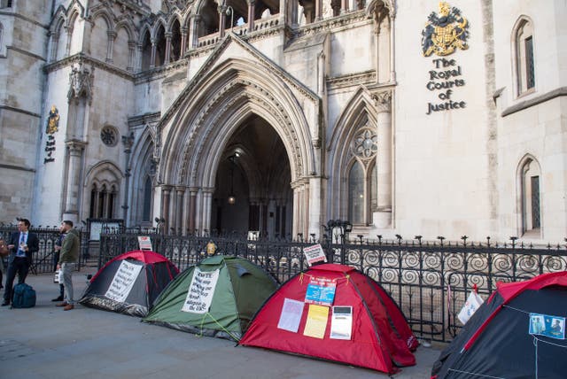 Demonstrators are camping outside the Royal Courts of Justice