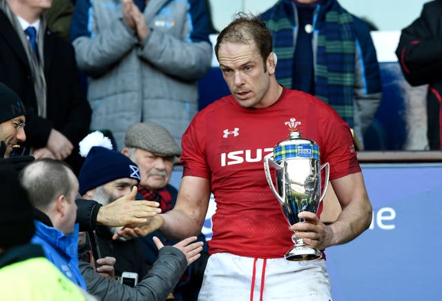 Alyn Wyn Jones with the Doddie Weir Cup after the game 
