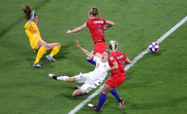 White was fouled by Becky Sauerbrun as England were awarded a penalty after a VAR decision