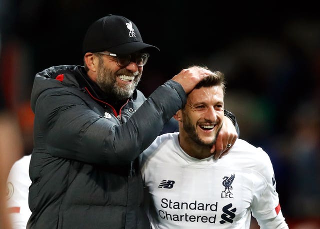 Jurgen Klopp (left) and Adam Lallana