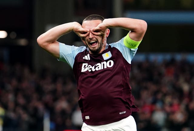 John McGinn puts his hands up to his eyes after scoring for Villa