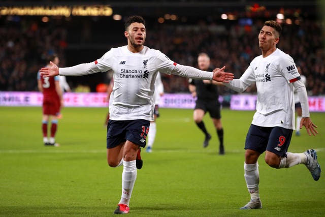 Oxlade-Chamberlain (left) scored Liverpool's second
