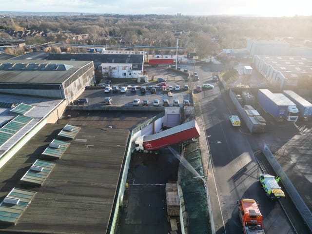 Drone images show the lorry wedged after leaving the road