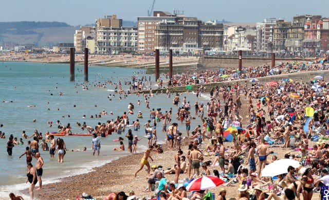 Some British beaches were packed this week but now foreign holidays are back on the cards (Gareth Fuller/PA)