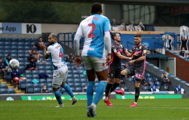 Mateusz Klich (right) scores his side's third goal (