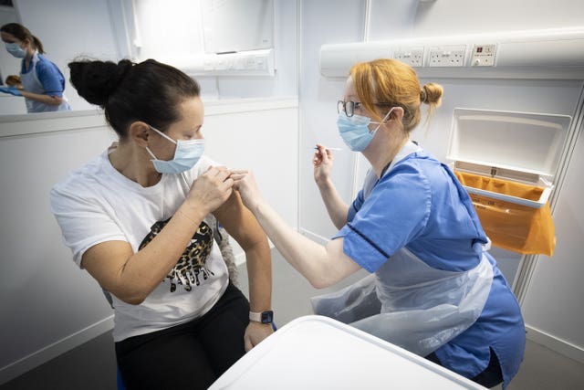 A person being vaccinated