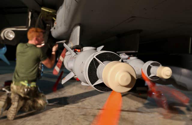 Tornado GR4s being armed with the Paveway IV (Neil Bryden/PA)