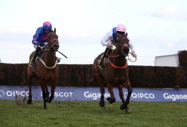 Waiting Patiently and Brian Hughes (right) see off Cue Card in the Ascot Chase