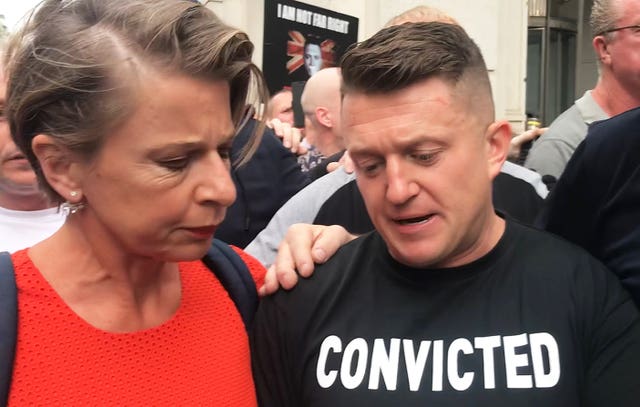 Tommy Robinson with Katy Hopkins as he arrives for his sentencing at the Old Bailey