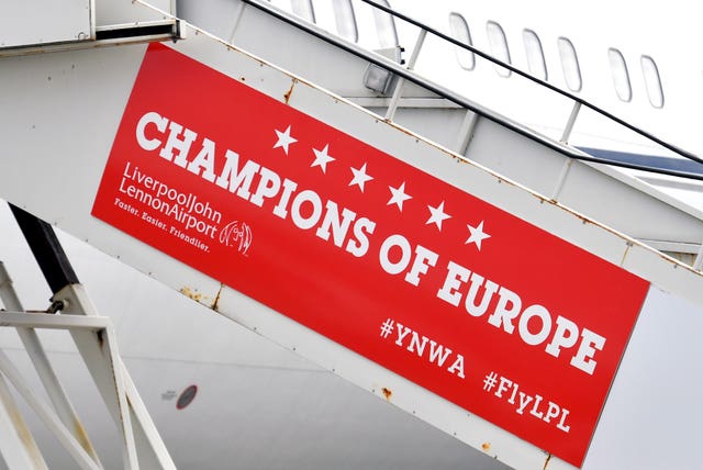 The team are welcomed home in fitting style by John Lennon Airport