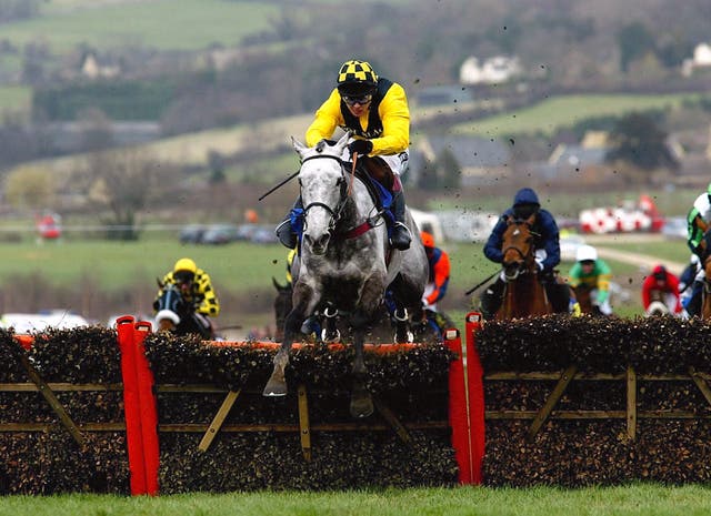 Rooster Booster and Richard Johnson on their way to Champion Hurdle success