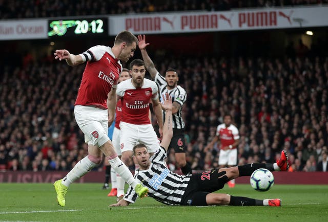 Arsenal up to third after routine win over Newcastle