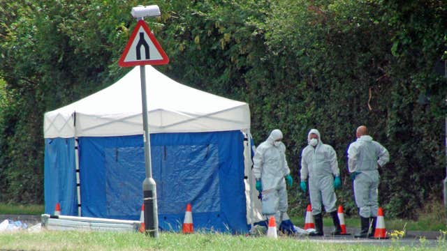 Forensic officers at work at the scene of the suspected hit-and-run in Cheltenham (Rod Minchin/PA)