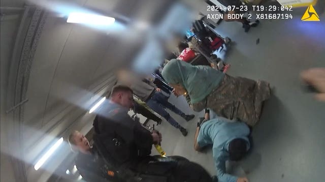 Video grab image issued by the Crown Prosecution Service (CPS) from police body worn camera of footage of the alleged assault of three police officers at Manchester Airport