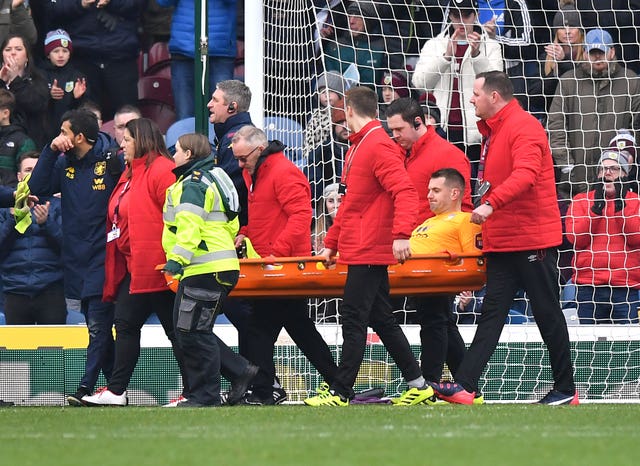 Tom Heaton was carried off on a stretcher 