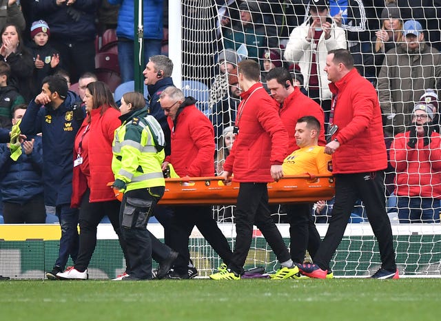 Tom Heaton was carried off on a stretcher