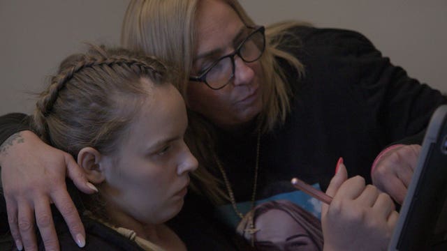Angel Lynn and her mother Nikki playing a game