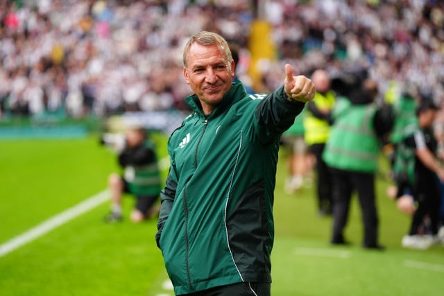 Brendan Rodgers gives a thumbs-up in the Celtic Park technical area
