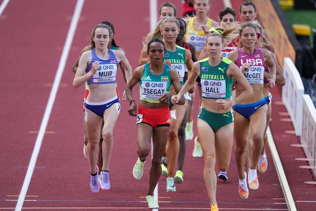 Laura Muir, left, progressed to the women's 1500m semi-finals by finishing second in her heat