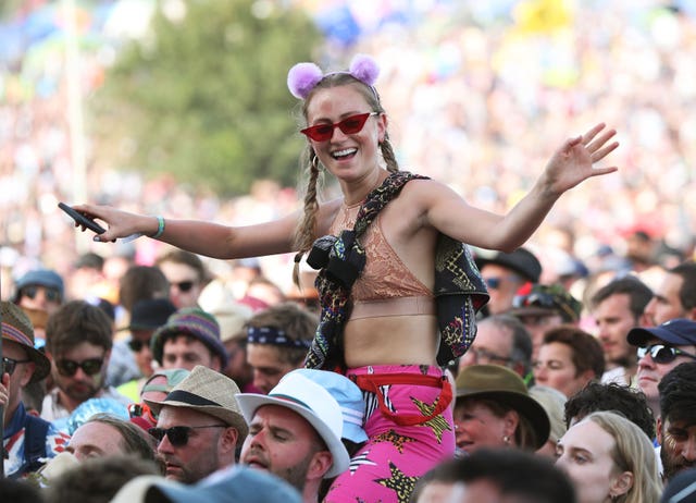 A member of the crowd enjoys the music