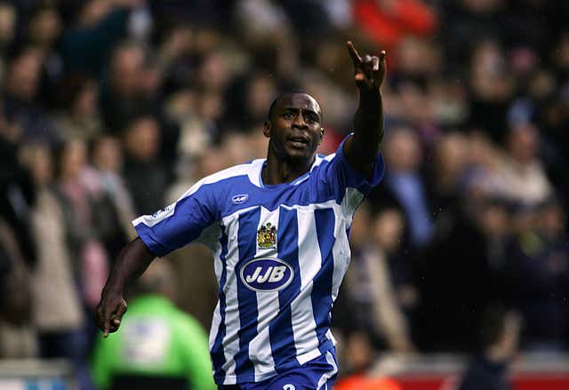 Wigan Athletic’s Jason Roberts celebrates his first goal