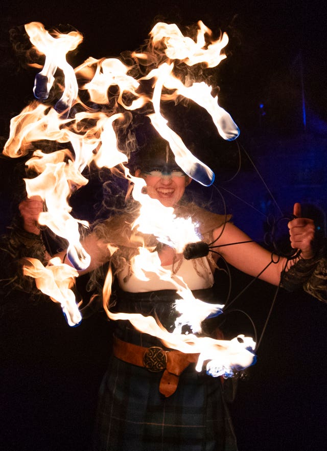 Fire jugglers perform