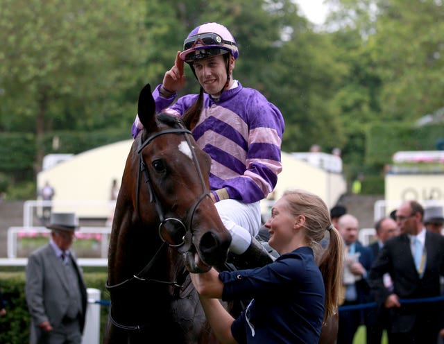 Jockey Cristian Demuro, here winning at Royal Ascot, will be aboard Land Lover
