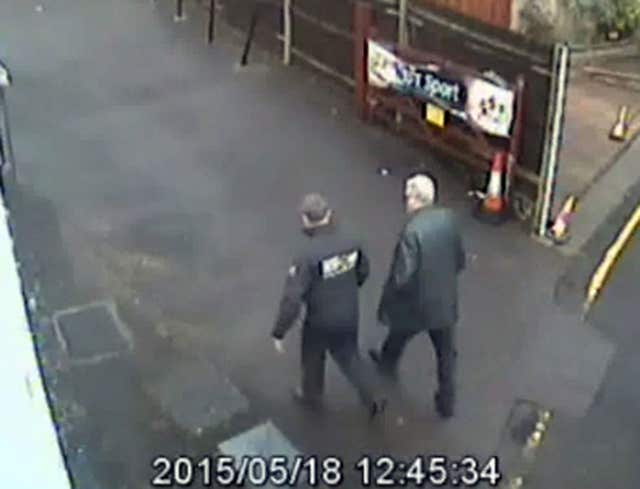John Collins and Hugh Doyle, left, at the rear of The Old Wheatsheaf Pub, beside Doyle's Workshop, in Enfield (Metropolitan Police/PA)