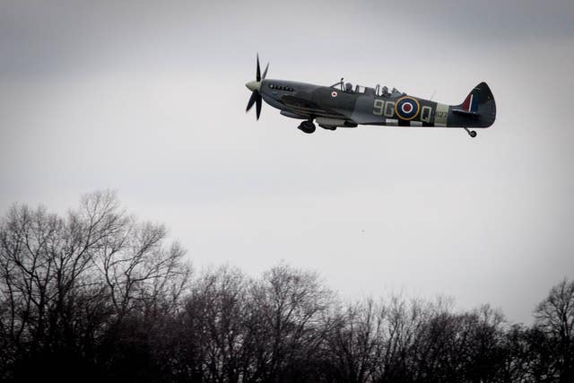 Former Spitfire pilot Squadron Leader Allan Scott takes to the skies (Stefan Rousseau/PA)