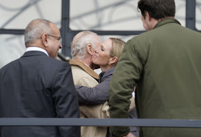 The King hugs his niece Zara Tindall at the Royal Windsor Horse Show in Berkshire