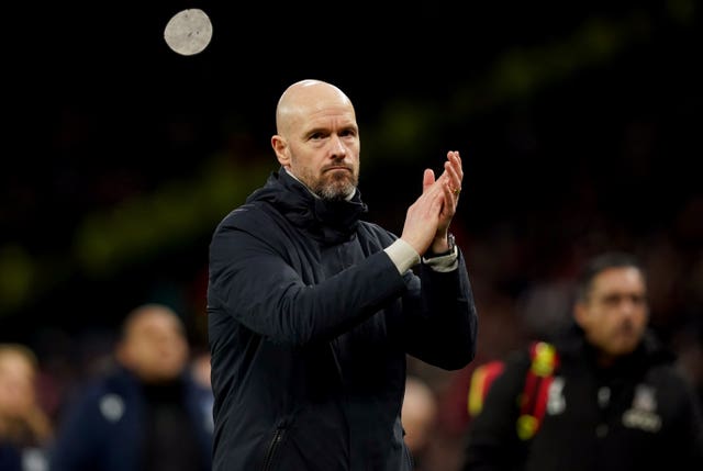 Erik ten Hag applauds the fans following the win over Crystal Palace
