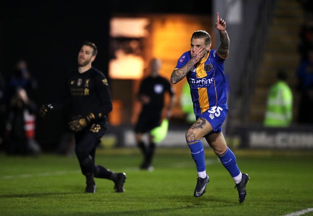 Jason Cummings' brace ensured a replay for Shrewsbury