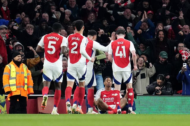Myles Lewis-Skelly, second right, celebrates with an Erling Haaland-style zen pose after scoring in Arsenal’s 5-1 win over Manchester City