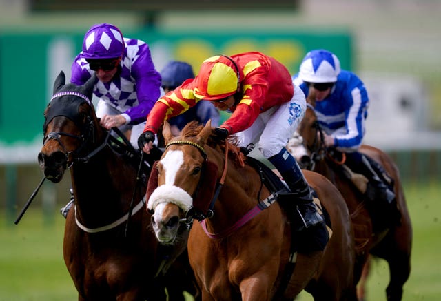 Gale Force Maya (centre) battles her way to victory